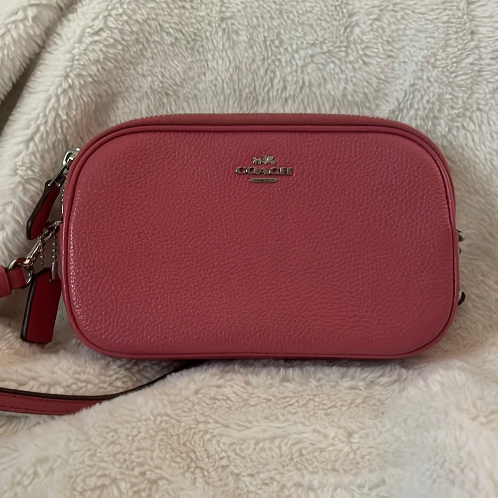 Pink double zip Coach crossbody bag